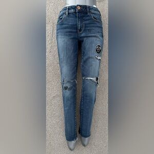 NWOT American Eagle Distressed Jeggings with patches/line drawings Size 10
